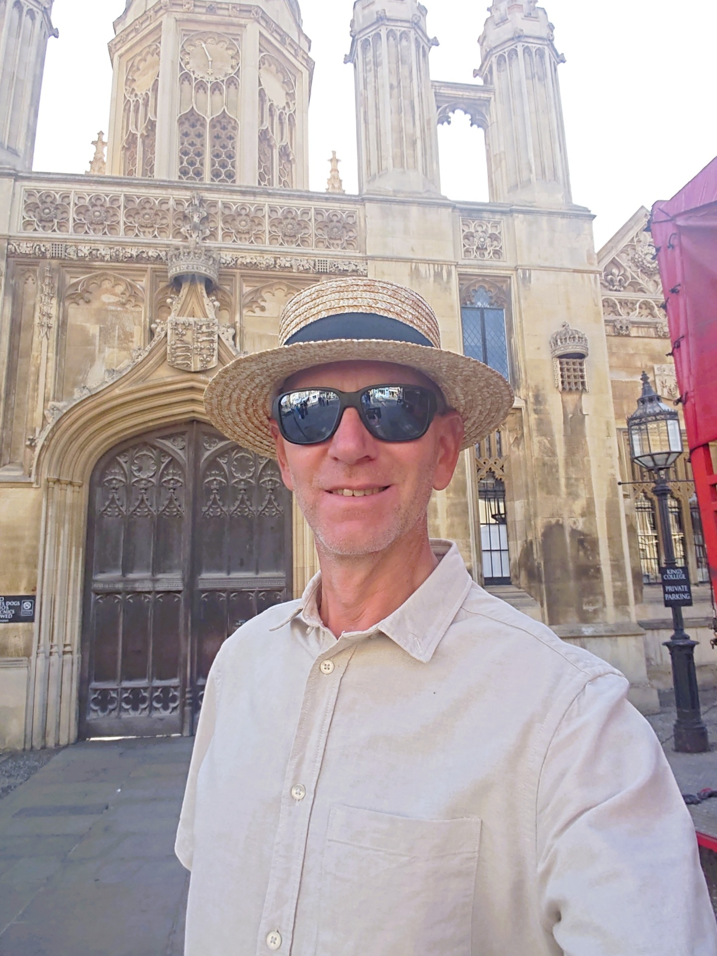 David in a boater hat on a Cambridge tour